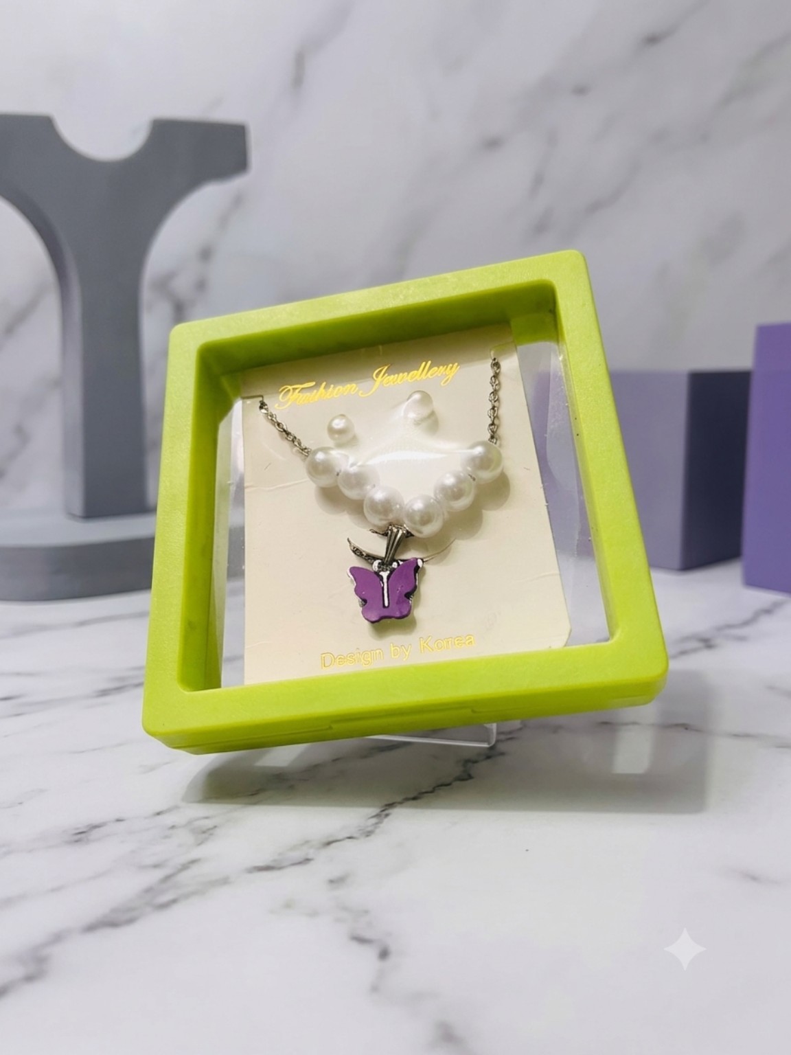 Pearl butterfly jewellery display