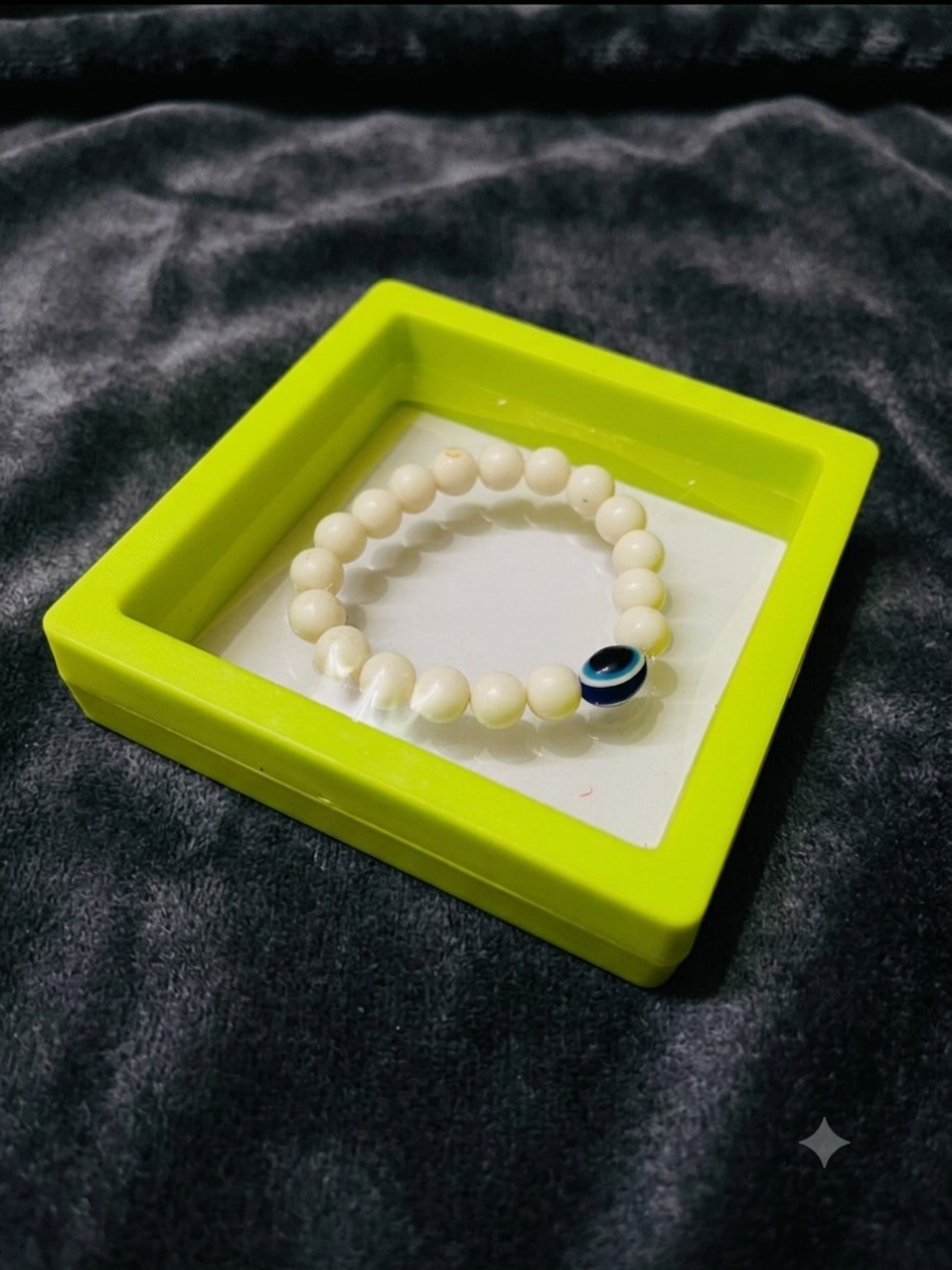 White pearl evil eye bracelet